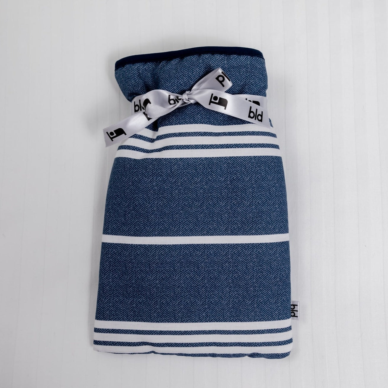 Small hot water bottle with soft cosy padded blue cover I mini hot water bottle